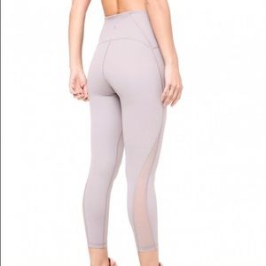 Lululemon train times leggings with mesh paneling. Size 4